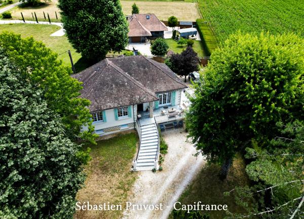 Saint-Front-la-Rivière (24) Maison à vendre 5 pièces, beaux volumes, lumineux, sou-sol aménagé, terrain 2194m2, 2chambres, studio et atelier.