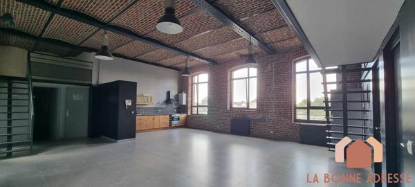 LOFT AVEC TERRASSE ET PARKING PRIVATIF
