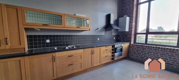 LOFT AVEC TERRASSE ET PARKING PRIVATIF