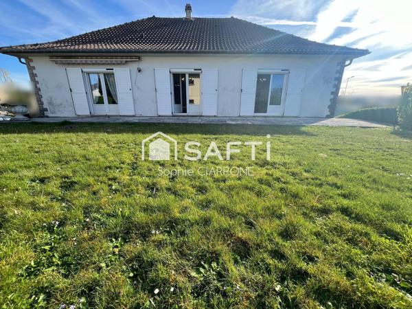 Maison de caractère – 195 m² habitables sur un terrain arboré de 8,60 ares avec deux belles terrasses et deux garages.– Environnement privilégié