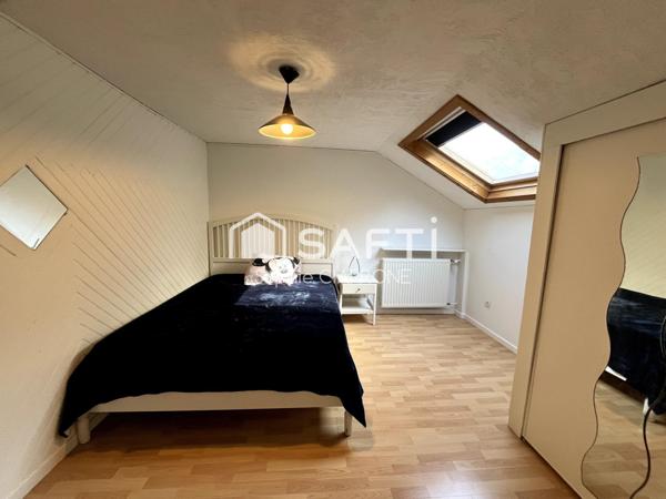 MAISON JUMELEE 110M2 AVEC GARAGE ;JARDIN; TERRASSES ET CABANON AU CALME PROCHE FRONTIERE