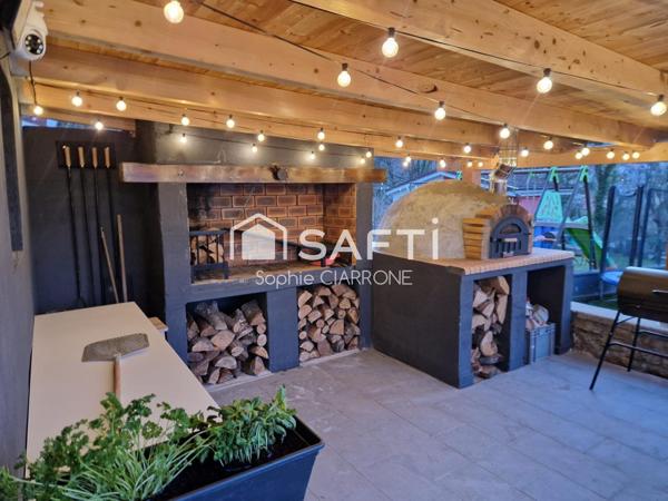 MAISON JUMELEE 110M2 AVEC GARAGE ;JARDIN; TERRASSES ET CABANON AU CALME PROCHE FRONTIERE