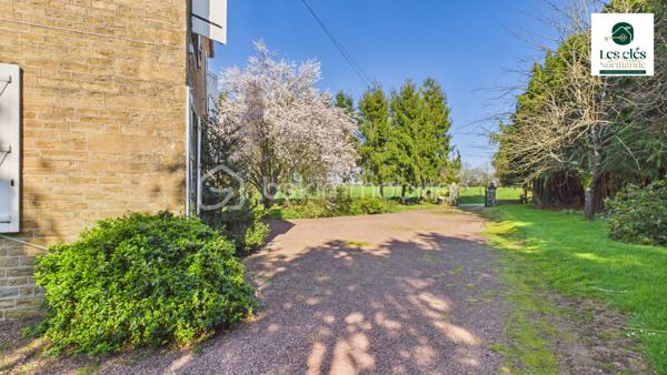 UNE MAISON BOURGEOISE, CINQ CHAMBRES, UN PARC DE PLUS DE 4 000 M²… ET ENCORE DU POTENTIEL !

Marie Morand – Les Clés de la Suisse Normande, l’immobilier dans nos Racines par BSK, vous présente cette élégante maison bourgeoise nichée dans un environnement verdoyant, à seulement 15 minutes des commerces et services de Thury-Harcourt – Le Hom et de Condé-sur-Noireau.

Ici, on retrouve ce que l’on aime dans les maisons de caractère : de beaux volumes, de l’espace pour toute la famille, un grand terrain et cette impression de respirer dès que l’on franchit le portail.

La maison offre surtout un véritable confort de vie avec la possibilité de vivre entièrement de plain-pied.

Au rez-de-chaussée, vous découvrirez un vaste salon lumineux et chaleureux, une cuisine aménagée et équipée, une chambre, une salle d’eau ainsi que des WC indépendants.

À l’étage, un grand palier dessert quatre chambres supplémentaires, une salle de bain et des WC. Chacun pourra donc disposer de son espace : chambres d’enfants, bureau, chambre d’amis, salle de jeux… à vous d’imaginer la suite.

Et si cinq chambres ne suffisaient pas, le grenier aménageable offre encore de belles possibilités : suite parentale, atelier, espace de télétravail ou pièce de loisirs.

À l’extérieur, la propriété s’étend sur un parc arboré de 4 370 m², suffisamment vaste pour profiter pleinement de la nature, recevoir, jardiner ou laisser les enfants courir, sans pour autant s’isoler complètement des commodités.

Une grande dépendance complète l’ensemble. Elle pourra accueillir vos véhicules, votre matériel, un atelier, du stockage ou accompagner un futur projet selon vos besoins.

Cette maison est faite pour vous si vous recherchez :

✨ Le charme et les volumes d’une maison bourgeoise
✨ Une véritable vie de plain-pied
✨ Cinq chambres et encore du potentiel
✨ Un parc arboré de plus de 4 000 m²
✨ Une grande dépendance
✨ Le calme de la campagne à seulement 15 minutes des services

Une propriété familiale, authentique et pleine de possibilités, pour celles et ceux qui rêvent d’espace, de nature et d’une maison dans laquelle écrire une nouvelle histoire.

Vous vous reconnaissez ? Alors cette maison mérite réellement votre visite.

Pour toute demande de rendez-vous, une pièce d’identité en cours de validité sera demandée, conformément aux obligations de vigilance applicables aux professionnels de l’immobilier, notamment dans le cadre de la réglementation TRACFIN. Les données et documents transmis seront traités dans le respect du RGPD.

Afin de préparer une visite cohérente avec votre projet et de vérifier sa faisabilité financière, la présentation d’un plan de financement, d’une attestation de faisabilité ou d’un justificatif de fonds datant de moins de trois mois sera également fortement appréciée.


Pour me joindre efficacement, privilégiez l'envoi d'un SMS, d'un e-mail ou d'un message par Messenger ou WhatsApp. Lorsque je suis en rendez-vous ou sur le terrain, le réseau n'est pas toujours très coopératif… et mon téléphone n'est pas nécessairement à portée de main.

Votre message me permettra d'identifier immédiatement le bien concerné et de vous rappeler personnellement dans les meilleurs délais.

Et parce qu'un projet immobilier peut aussi commencer par une recommandation : pensez à Mareco !

Vous connaissez quelqu'un qui souhaite vendre un bien ? Recommandez-le-moi via Mareco by BSK et soyez récompensé(e) si votre recommandation aboutit à une vente, selon les conditions du programme.

Application disponible sur Google Play et l'App Store.
Mon code de parrainage MARECO : 574646
Cette annonce référence 343738 vous est présentée par votre agent commercial BSK Immobilier MARIE MORAND (EI) immatriculé au RSAC de CAEN (14000) sous le numéro 53772786900027.
