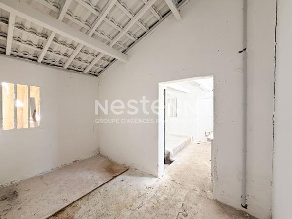 Gardanne centre ville-Maison 4 pièces d'une surface de 135 m2 avec une grande remise et jardin.