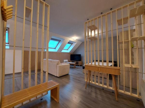 À saisir : Appartement type loft vendu meublé avec place de parking couverte et sécurisé