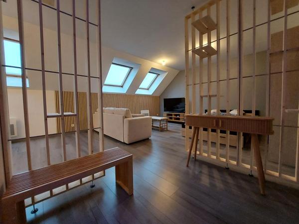 À saisir : Appartement type loft vendu meublé avec place de parking couverte et sécurisé