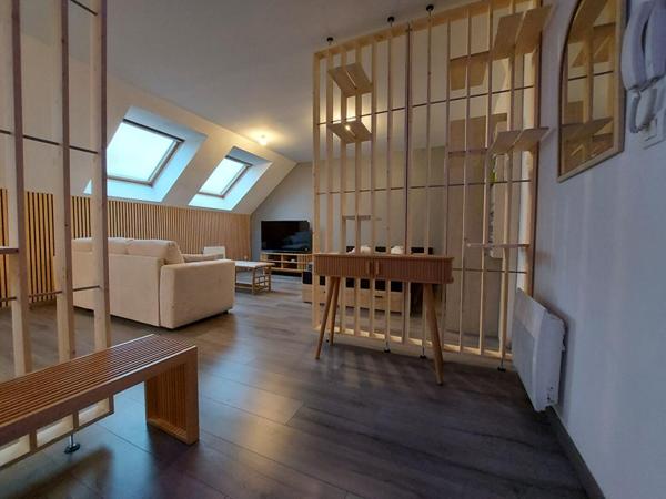 À saisir : Appartement type loft vendu meublé avec place de parking couverte et sécurisé