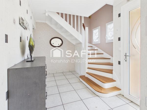 Maison de 115m² sur un terrain de 490m², 3 chambres avec garage et véranda chauffée