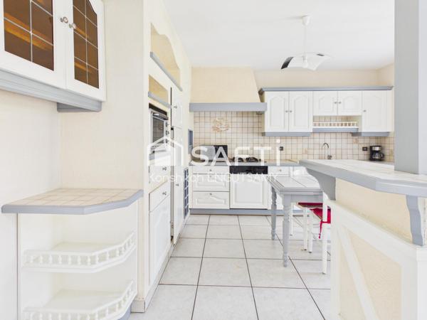 Maison de 115m² sur un terrain de 490m², 3 chambres avec garage et véranda chauffée