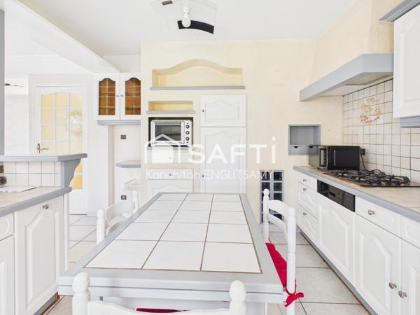 Maison de 115m² sur un terrain de 490m², 3 chambres avec garage et véranda chauffée