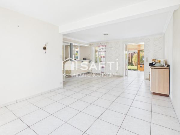 Maison de 115m² sur un terrain de 490m², 3 chambres avec garage et véranda chauffée
