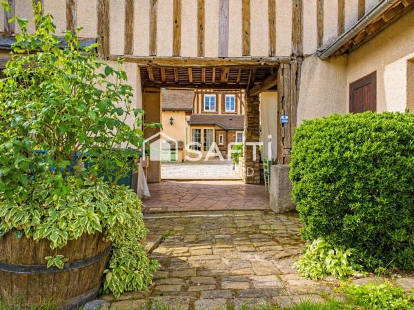 Maison de caractère 228 m² avec jardin en centre-ville