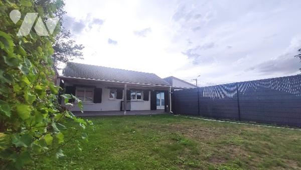 Campagne proche de Beaurains : Plain-pied individuel avec carport et garage.