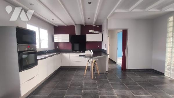 Campagne proche de Beaurains : Plain-pied individuel avec carport et garage.