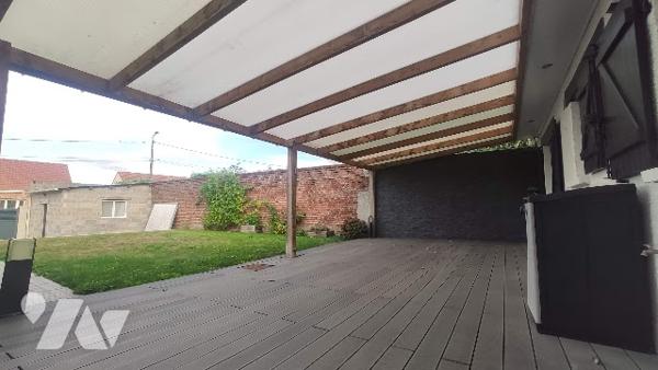 Campagne proche de Beaurains : Plain-pied individuel avec carport et garage.