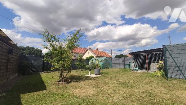 Campagne proche de Beaurains : Plain-pied individuel avec carport et garage.