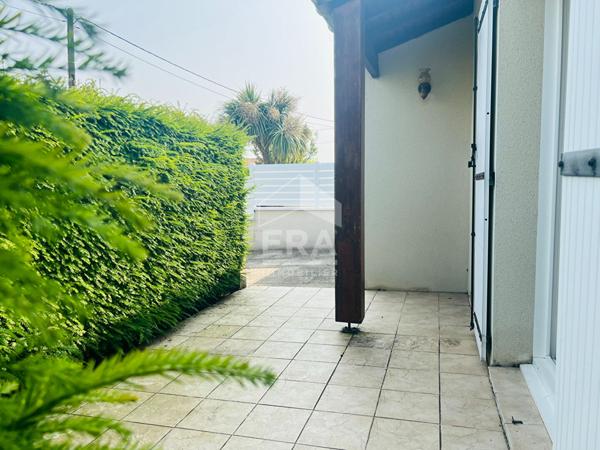 PLAIN- PIED - 2 CHAMBRES - proche commerces - GARAGE