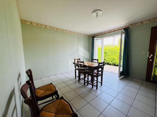 PLAIN- PIED - 2 CHAMBRES - proche commerces - GARAGE