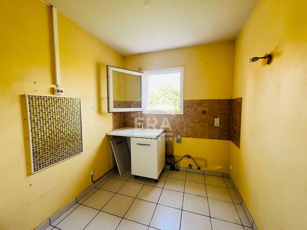 PLAIN- PIED - 2 CHAMBRES - proche commerces - GARAGE