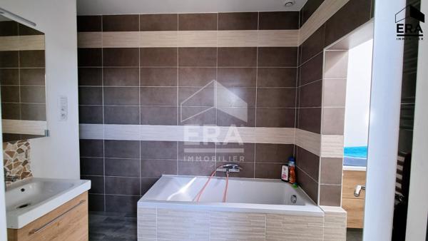 Maison en centre ville avec jardin et garage