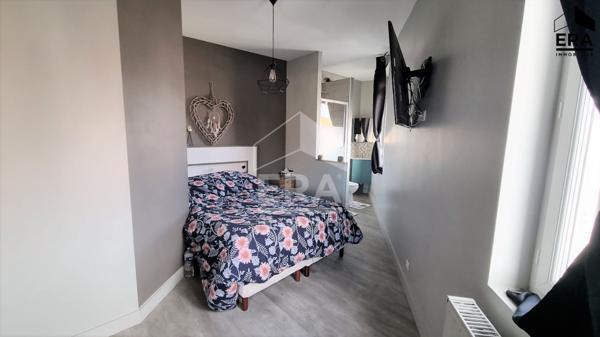 Maison en centre ville avec jardin et garage