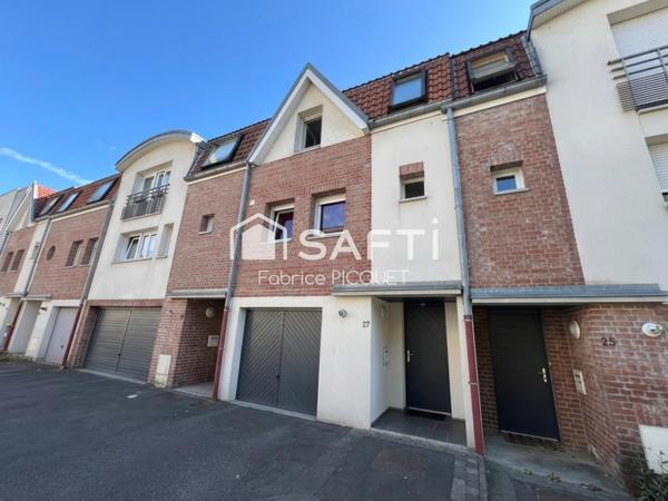 Maison de ville avec trois chambres, garage et jardin