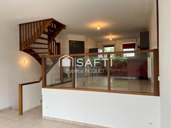 Maison de ville avec trois chambres, garage et jardin