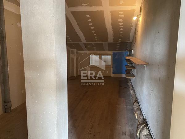 Maison familiale avec jardin, garage et fort potentiel d'aménagement
