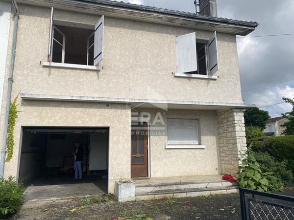Maison familiale avec jardin, garage et fort potentiel d'aménagement