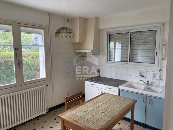 Maison familiale avec jardin, garage et fort potentiel d'aménagement