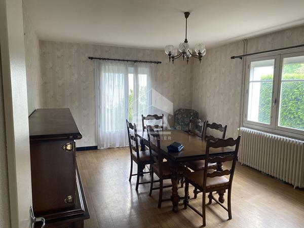 Maison familiale avec jardin, garage et fort potentiel d'aménagement