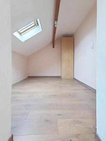 T3 de 75 m² avec jardin privatif, parking, garage et cave