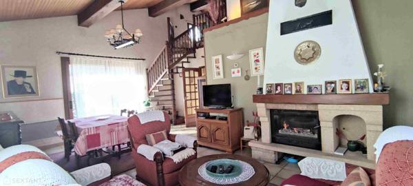 Maison 4 faces avec jardin et garage