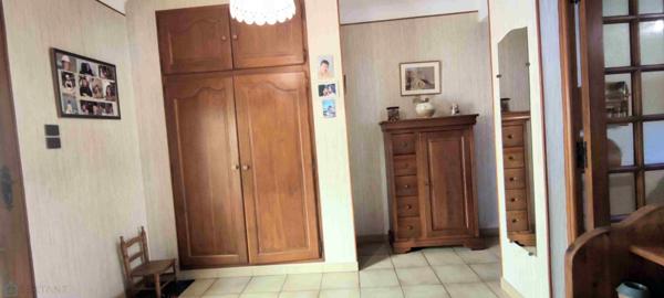 Maison 4 faces avec jardin et garage