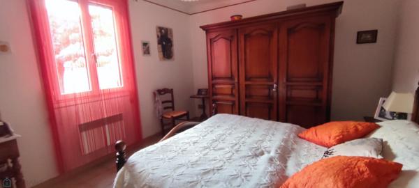 Maison 4 faces avec jardin et garage