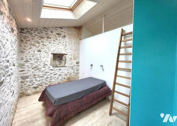 Maison de charme mêlant pierre et bois