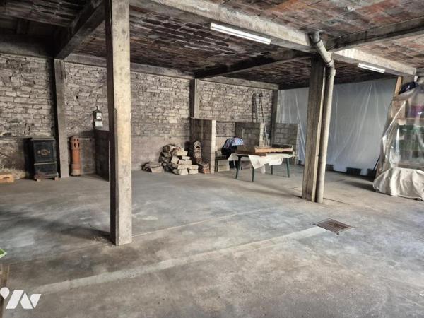 immeuble avec 4 appartements + grande dépendance