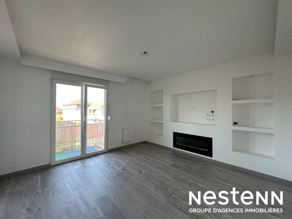 Appartement 3 pièces entièrement rénové avec balcon, cuisine équipée et grand séjour lumineux à Bischwiller