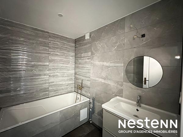 Appartement 3 pièces entièrement rénové avec balcon, cuisine équipée et grand séjour lumineux à Bischwiller