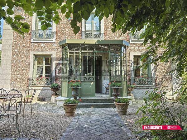 MAISON CENTRE VILLE AVEC GARAGE ET JARDIN