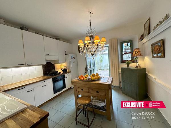 MAISON CENTRE VILLE AVEC GARAGE ET JARDIN