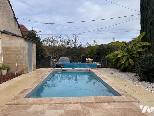 Maison de plain pied avec piscine proche centre ville