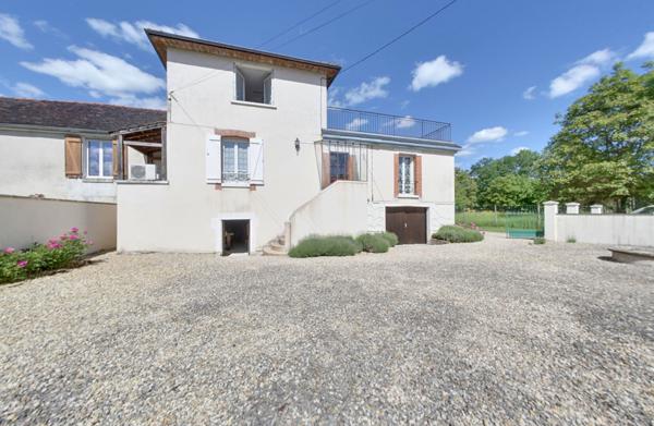 Maison familiale avec grand terrain arboré