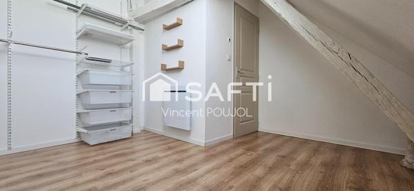 Duplex rénové avec place de parking.