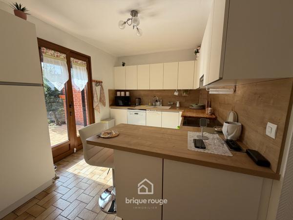 Belle maison semi-individuelle avec jardin et garage