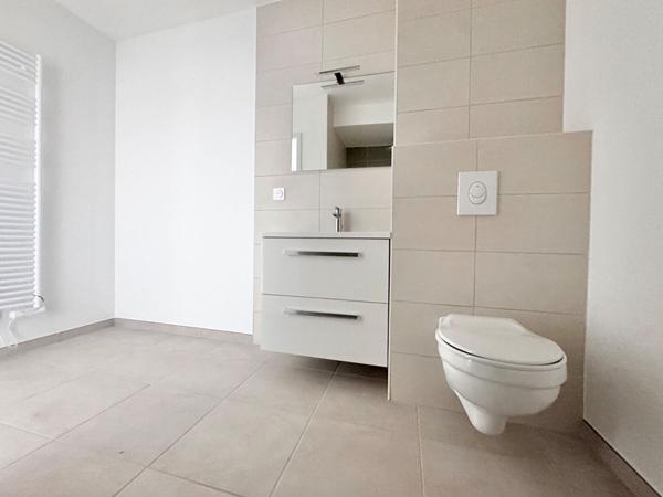 T3 avec terrasse couverte (10m²) + 1 garage + 1 parking souterrain