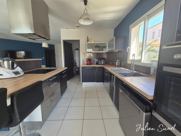 Villa 4 faces avec piscine