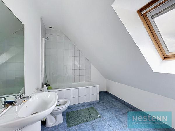 Maison à vendre bourg de Pommeret - Maison de 2008 dans le bourg de Pommeret, profitant de trois chambres , un jardin, un garage et d'espaces agréables  !