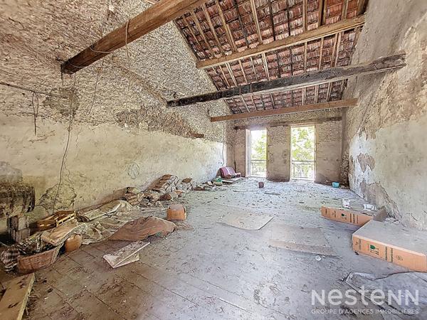 À vendre : Maison à rénover de 148 m² avec garage de 62 m² et grenier de 73 m², située au centre de Condom
