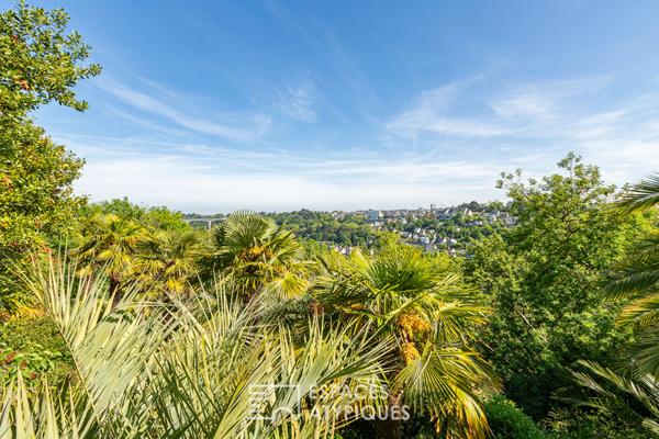 Maison avec son grand parc paysagé